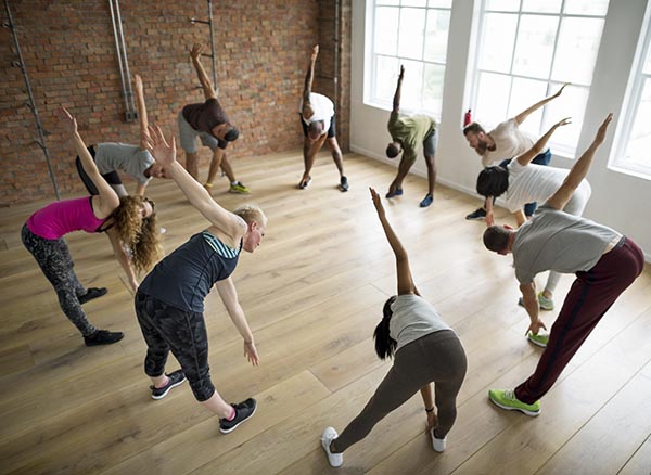 Diversity People Exercise Class Relax Concept Corporate Wellness Programs